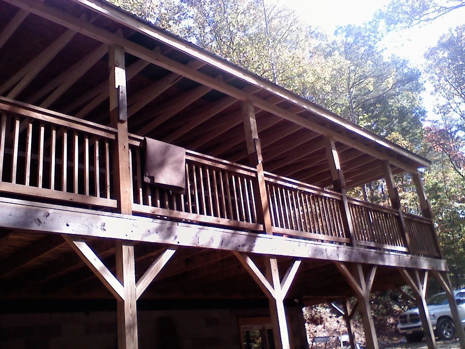Timber framing under a new elevated porch and deck — Roof Leak Repair in Twin Lakes by Roofing Brothers